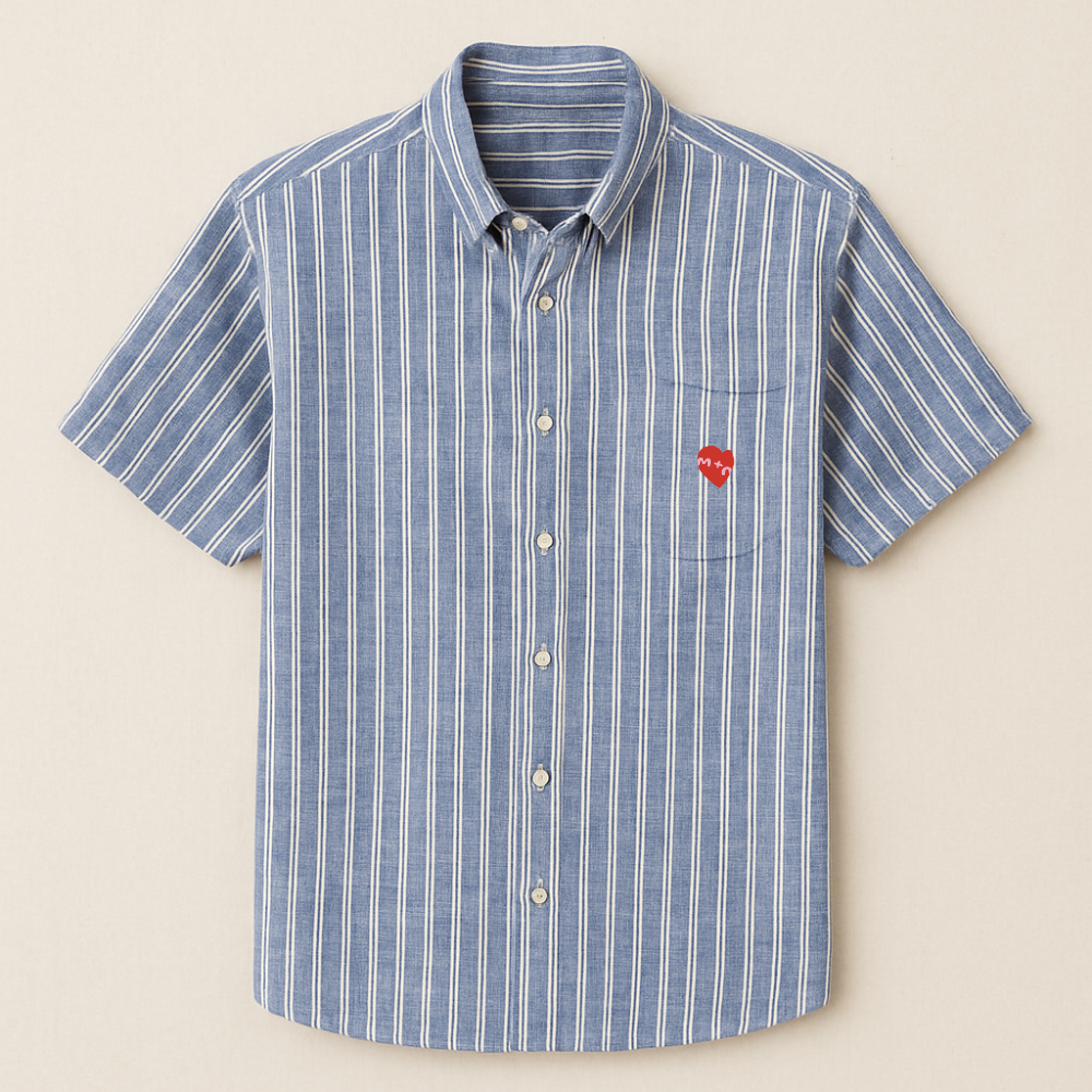 Blue and white striped shirt with a red heart on a beige background