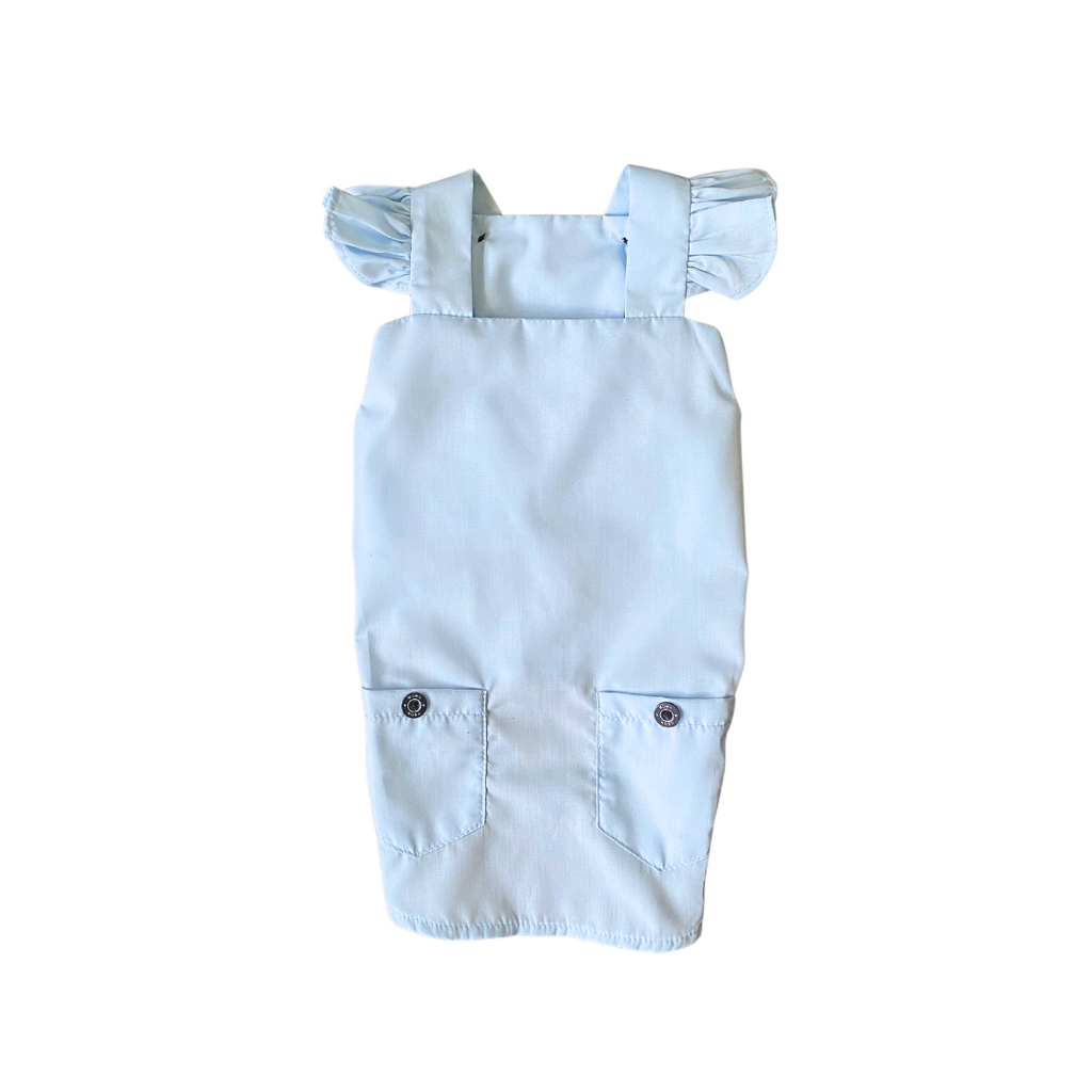 Light blue dress with ruffled straps on a white background