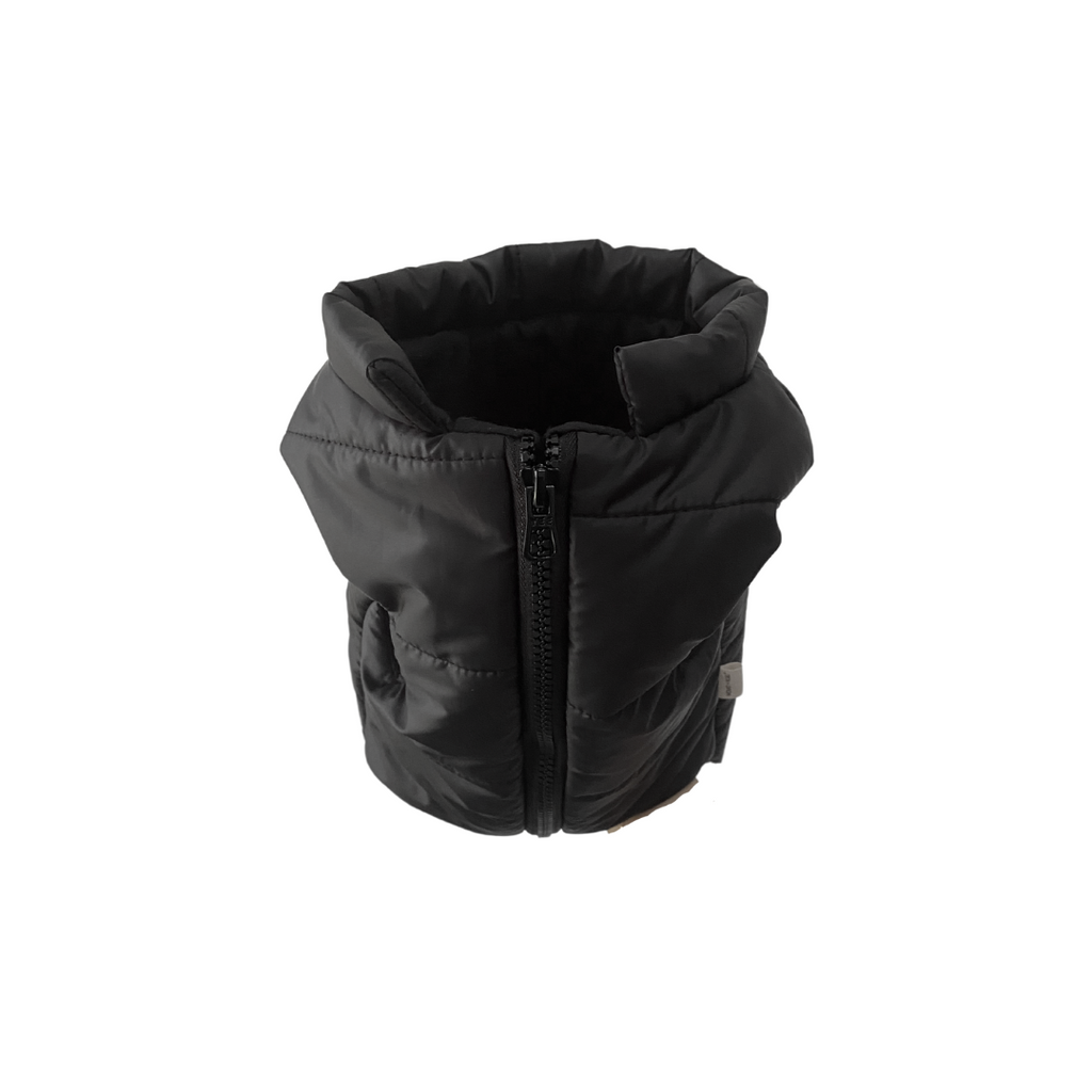 Black puffer vest on a white background