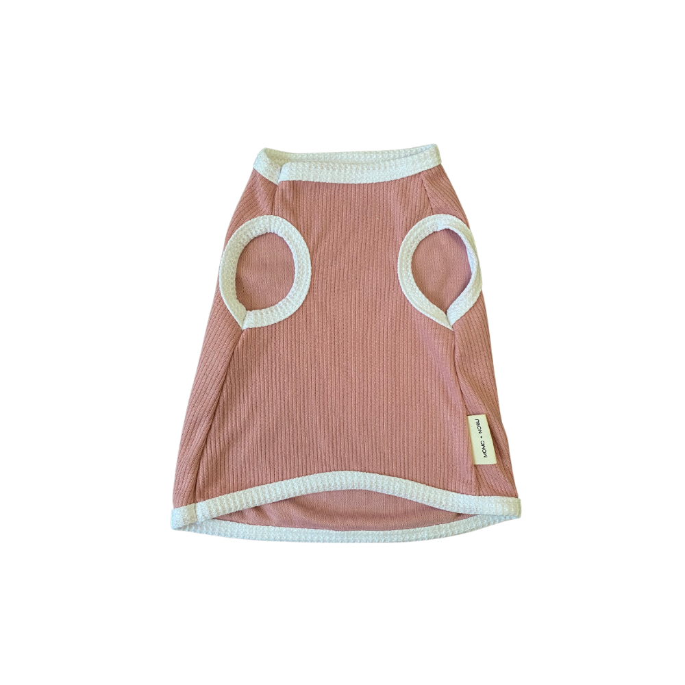 Pink pet dress with mesh panels on a white background